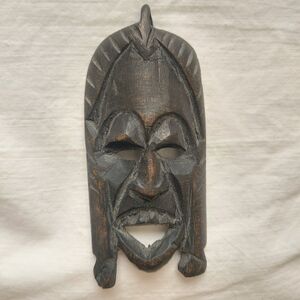 Carved Wooden Pendant